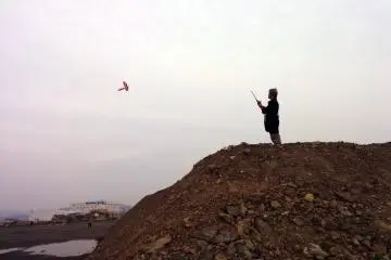 <p>For a moment, the simple joy of flying a kite makes nothing else matter</p>