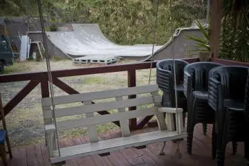 <p>Porch swing and skateboarding ramp</p>