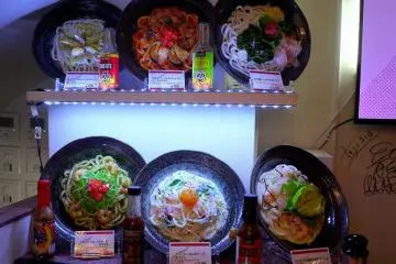 <p>The usual plastic models of the food near the door</p>