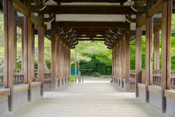 <p>The roofed passageway has long benches on both sides</p>