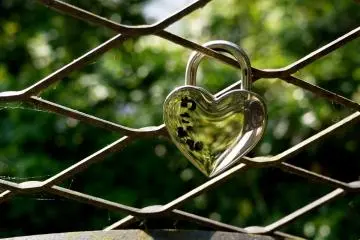 <p>This lovers' padlock on a fence reminds me of the Pont des Arts Bridge in Paris</p>