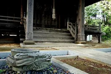 Even the wooden verandah posts feature carved motifs