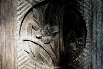 <p>Carving of an iris</p>