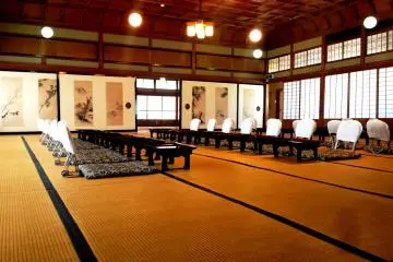The majestic banquet hall on the top floor, with a curved ceiling reflecting aristocratic fashion at that time.
