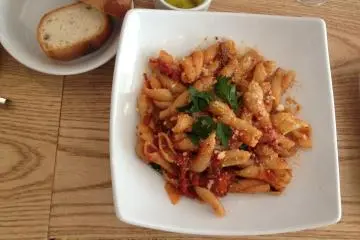 <p>Tender pork and vegetable pasta (no mushrooms) with complimentary bread.</p>