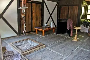 <p>Guest room at Tsurunoyu Onsen with 'Irori' (traditional fire-pit)</p>