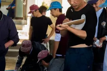 <p>Orders are placed at the fish market</p>