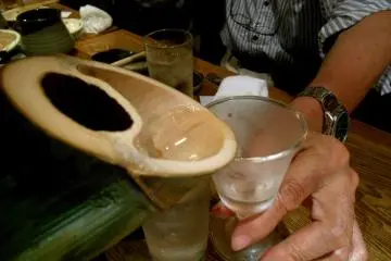 <p>There's a small hole from which the sake can be poured</p>