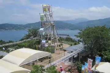 Ferris Wheel and Clifftop Roller Coaster