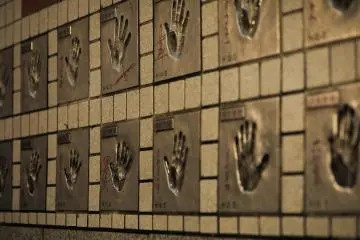 <p>The hand prints of the famous Japanese performers outside Asakusa public hall.</p>