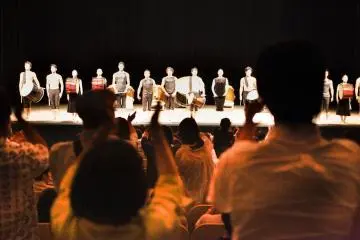 <p>The closing ceremony, where all performers return to the stage to be recognized by the audience for their performance.</p>
