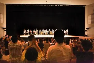 <p>The closing ceremony, where all performers return to the stage to be recognized by the audience for their performance.</p>