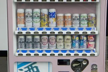 <p>Although these outdoor beer vending machines are rarer in cities these days, you can still find them in small towns like Yobuko</p>