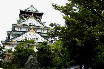 <p>The main tower viewed from the open space with stones and trees...ummm...people are disturbing the scenery...</p>