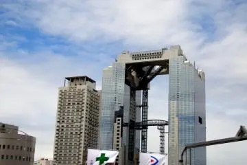 <p>Umeda Sky Building and the Westin Hotel Osaka under the blue sky</p>