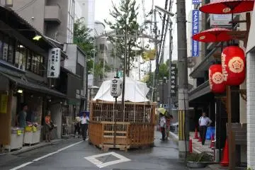 <p>Some of the floats are decorated with live pine or bamboo branches</p>