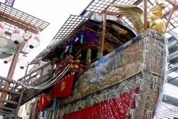 <p>Valuable float hangings are covered with plastic to protect them from rain</p>