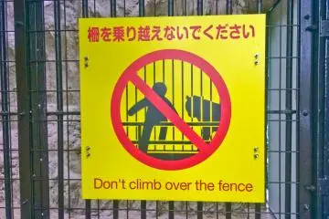 For obvious reasons as the sign says; don't enter the Lion or Tiger enclosure!