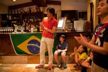 <p>Some of the guests enjoying and clapping along to the traditional Brazilian music</p>