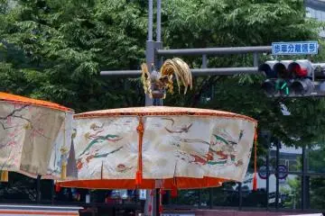<p>Ayagasa-hoko (綾傘鉾) During the Yamaboko Junko (山鉾巡行) in Kyoto, 2012! This is one of the parasol-type floats that are regarded as a prototype of the Gion festival floats. This float features a large parasol, and is accompanied by divine messenger boys known as &ldquo;Chigo&rdquo;, and a troupe of magicians and stick-twirlers during the parade</p>