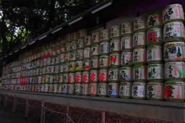 <p>If you enter via the Harajuku Station entrance, then on the way to the Temple you will pass these barrels of sake wrapped in straw. They are offered to show respect to Emperor Meiji and Empress Shoken, who encouraged Japanese industries.</p>