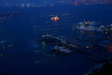 <p>Lights on a tour boat are the brightest thing out on the water</p>