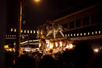 <p>One of the nine floats of the parade. Many of the participants chanted and danced while on the floats.</p>