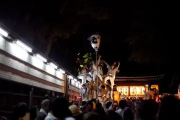 <p>One of the nine floats of the parade. Many of the participants chanted and danced while on the floats.</p>