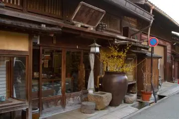 The front of a ceramic shop. I particularly like the old wooden sign of the shop, just above the entrance.