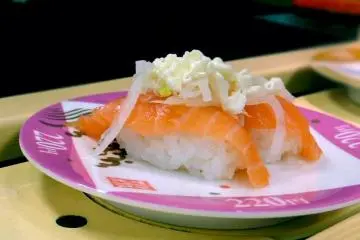 <p>Of course a salmon sushi topped with onion and mayonnaise to complete the sushi experience.</p>