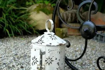 <p>A pretty white tin lantern</p>