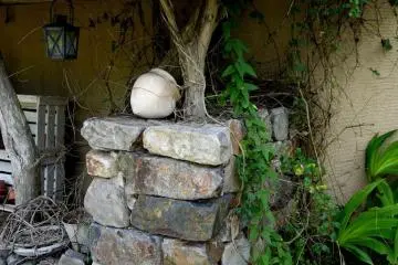 <p>A rustic lean-to against the wall</p>