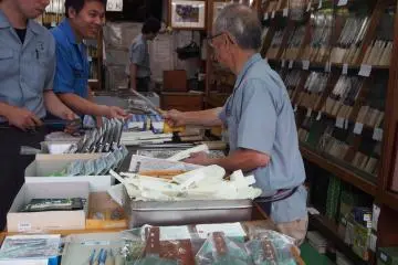 <p>An expert inspects the knives carefully before they go on sale</p>