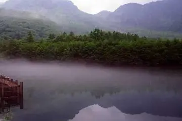 Taisho Pond and Mt. Yakedake, an active volcano. The pond was created by an eruption of&nbsp;Yakedake in the&nbsp;Taisho&nbsp;era.