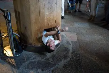 <p>The wooden pillar with hole in that you can get through if you wish to!</p>