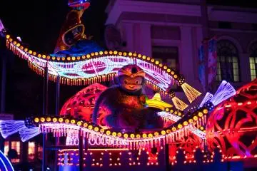 <p>People in costume moving around and dancing.&nbsp;</p>