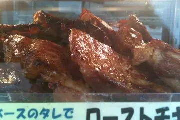 Roasted chicken sold outside at the take-out stand