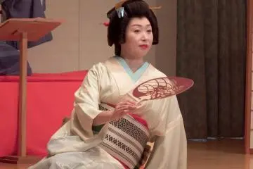 <p>A woman, looking into the distance, is longing for her lover</p>