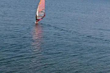 <p>Watch the windsurfers&nbsp;fly across the bay; inquire downstairs at Kaoi if your want to give it a try</p>