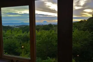 <p>Mt Fuji at sunset framed beautifully by the windows in the waiting area</p>