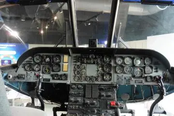 <p>Piloting (?) a helicopter!</p>