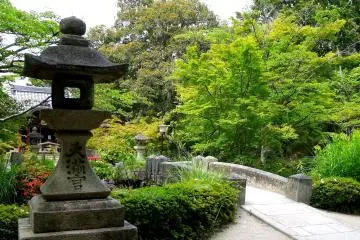A stone lantern beside the pond