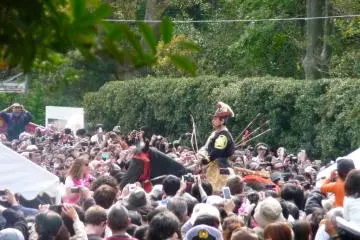 Samurai archer on horseback in a sea of spectators