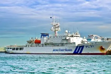<p>A Coast Guard ship docked along the port near Aka-Renga</p>