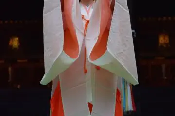 <p>A Shrine maiden performs&nbsp;Kagura for the kami</p>