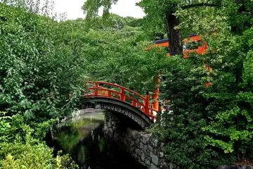<p>Red bridge over the Mitarashi River</p>