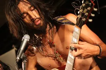 Lead singer and guitarist Youhei Miyake&nbsp;of Inushiki (Dogggy Style), takes the stage