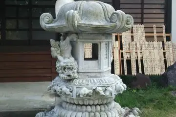 <p>This stone lantern is very ornate. Dragons have a long history both in Japan and in Buddhism.</p>