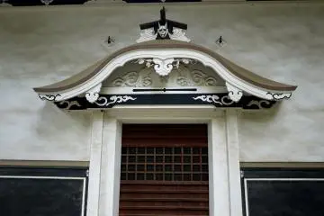 <p>A grinning demon over the door</p>