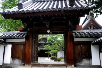 <p>This gate frames a view of an inner courtyard</p>
